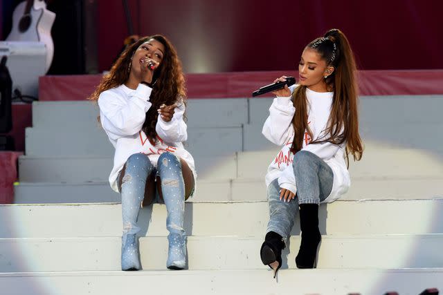 Dave Hogan/Getty Ariana Grande and Victoria Monét