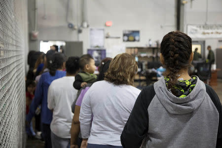 A view of inside U.S. Customs and Border Protection (CBP) detention facility shows detainees inside fenced areas at Rio Grande Valley Centralized Processing Center in Rio Grande City, Texas, U.S., June 17, 2018. Courtesy CBP/Handout via REUTERS