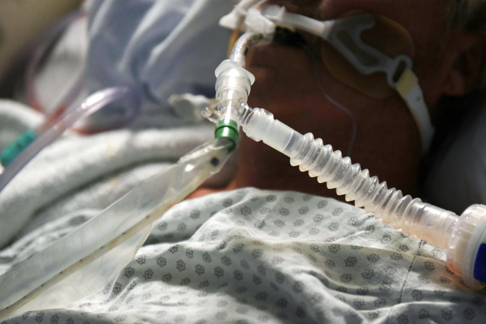 A patient on a ventilator is seen as medical professionals treat patients infected with the coronavirus disease (COVID-19) at United Memorial Medical Center in Houston, Texas on November 12, 2020.  (Callaghan O'Hare/Reuters)