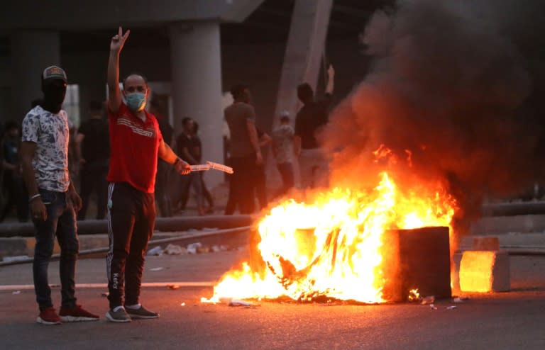 Iraqis protest against corruption and the lack of basic services outside the regional government headquarters in the southern city of Basra on September 5, 2018