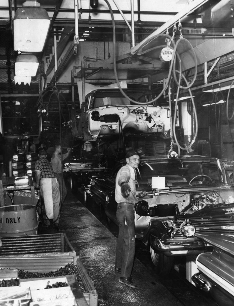 Workers put together cars on the Chevrolet assembly line in the General Motor plant in Norwood in 1959. The plant was active from 1923 to 1987.