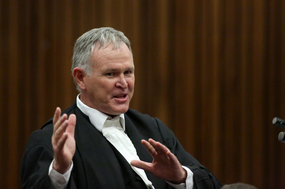 Oscar Pistorius' attorney Barry Roux speaks in court on the third day of his trial at the high court in Pretoria, South Africa, Wednesday, March 5, 2014. Pistorius is charged with murder for the shooting death of his girlfriend, Reeva Steenkamp, on Valentines Day in 2013. (AP Photo/Siphiwe Sibeko, Pool)