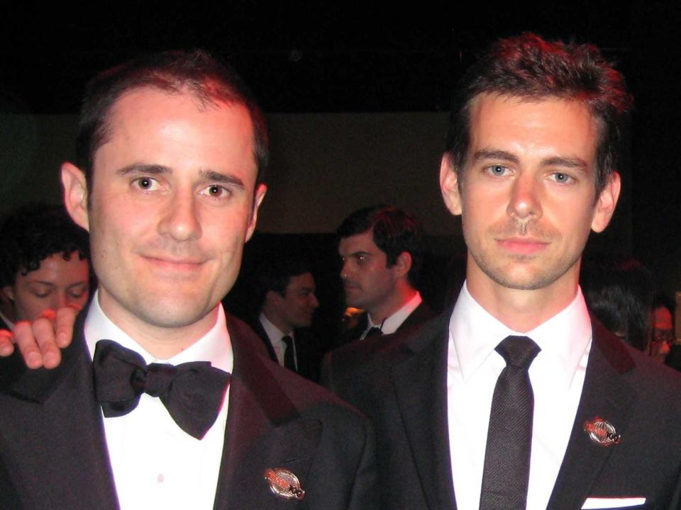 Evan Williams and Jack Dorsey in suits and ties.