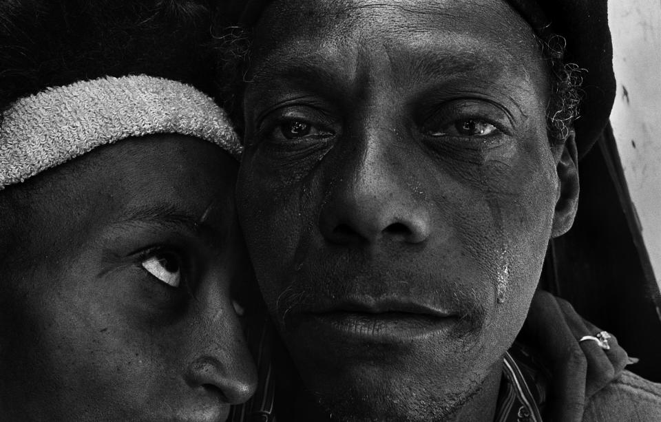 <p>Fred, who has just returned from prison, weeps as he greets his former girlfriend Rose in a New York City shantytown, 1986. (© Eugene Richards) </p>