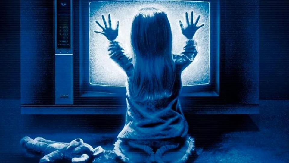 Carol Anne hears the call of "the TV people" in Poltergeist.
