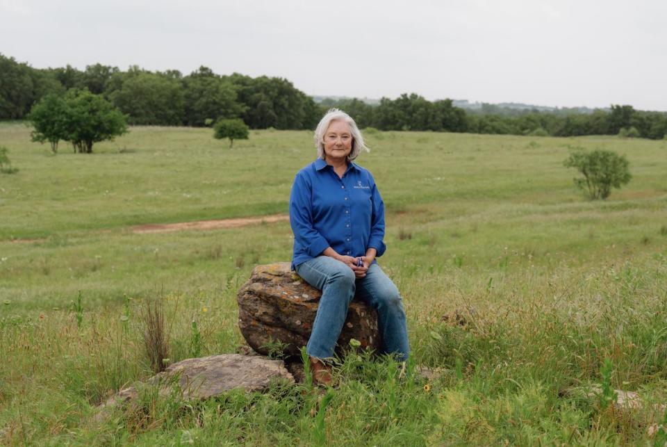 Deborah Clark poses for a portrait on Birdwell and Clark Ranch, land owned by Ms. Clark and her husband, on Monday, May 6, 2024 in Henrietta, Texas. The city of Wichita Falls is seeking a permit to construct Lake Ringgold in Clay County, a reservoir the city says will help with future water needs. Residents and ranchers of Clay County, such as Ms. Clark, say they will lose acres of their property and claim the project is unnecessary.                                                                             