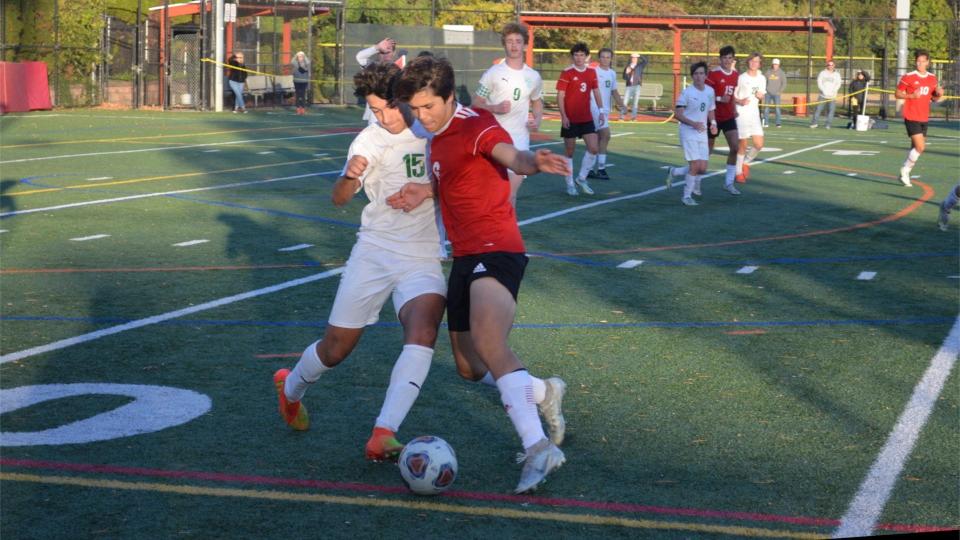 West Deptford's Michael MonteCarle (15) and Gabe Chatten of Haddon Township battle for possession during their South Jersey Coaches Association Tournament semifinal match on Thursday, October 20, 2022, at the Recchino Sports Complex in Haddon Township.