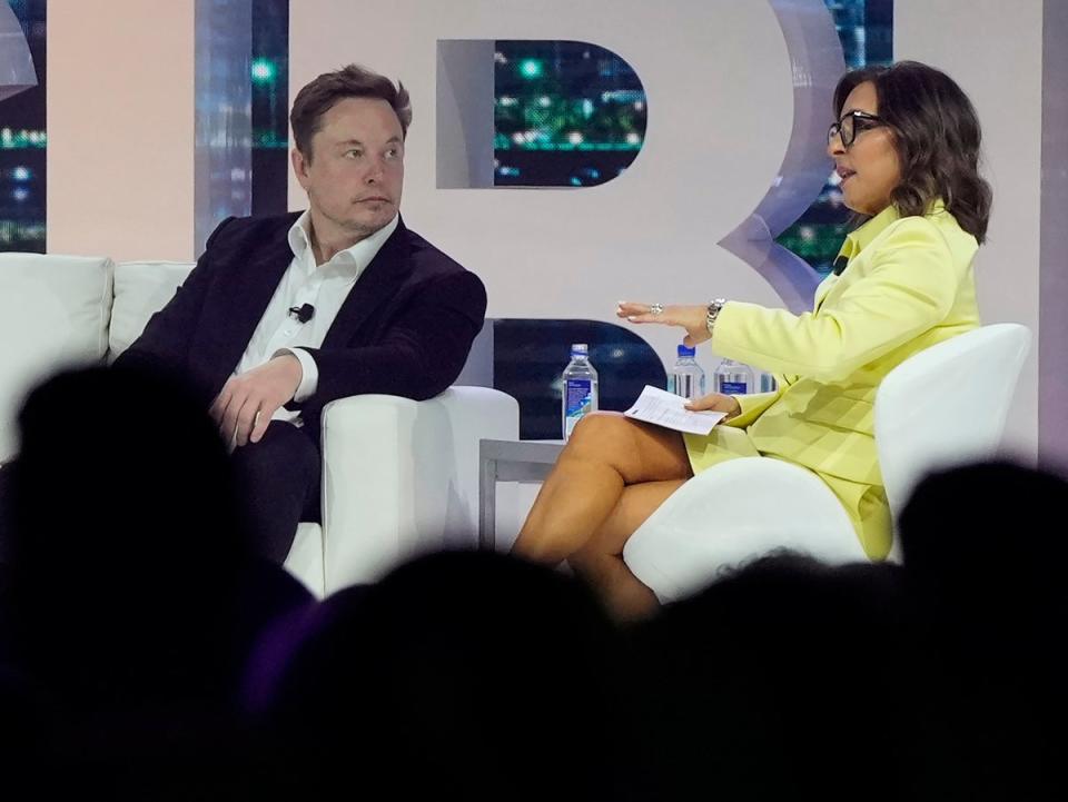 Linda Yaccarino, right, chats with Elon Musk at a conference two months before joining X (Rebecca Blackwell/AP)