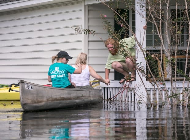 Jason Lee/The Sun News via AP