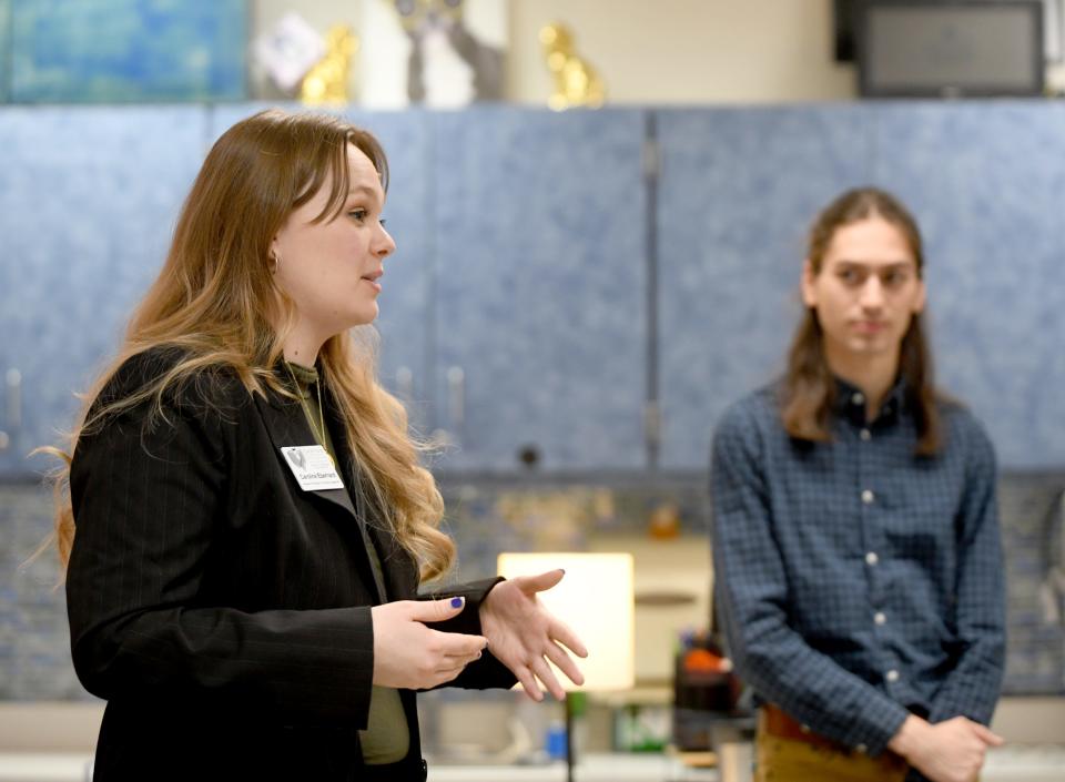 Caroline Eberhard, manager of education and community engagement for the Canton Symphony Orchestra, and Bryce Kessler, director of music and arts programing for The Well, visit students in Jennifer Schott's second grade class at Worley Elementary School. The orchestra and The Well partnered to bring the Mindful Music Moments program to the school. Each morning, students listen to a different piece of music to begin their day.