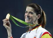 2016 Rio Olympics - Athletics - Victory Ceremony - Women's High Jump Victory Ceremony - Olympic Stadium - Rio de Janeiro, Brazil - 20/08/2016. Ruth Beitia (ESP) of Spain poses with her gold medal. REUTERS/Stoyan Nenov