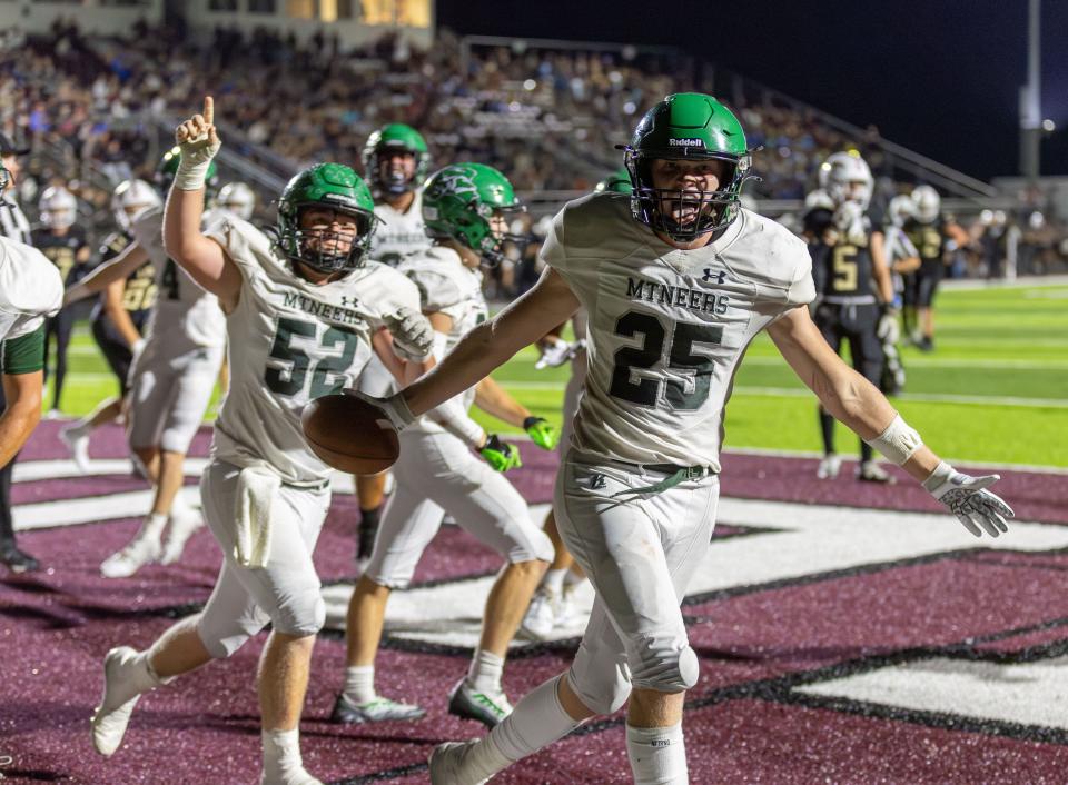 Mountain Vernon’s Ryder Dampf celebrates a late touchdown with teammates during the Mountaineers win of Logan-Rogersville on September 15, 2023.