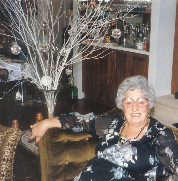 Catherine Lombardi in her home during Christmastime.