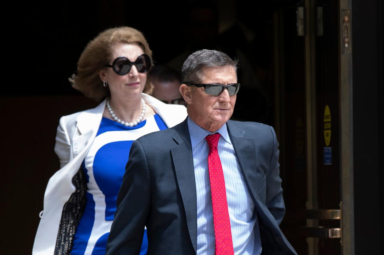 Flynn leaves the federal courthouse in Washington on June 24, 2019, followed by his lawyer Sidney Powell. She would become famous for her wild election theories. (Photo: Manuel Balce Ceneta/AP)