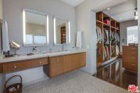 <p>There’s also massive double vanity and a walk-in closet. (Zillow) </p>