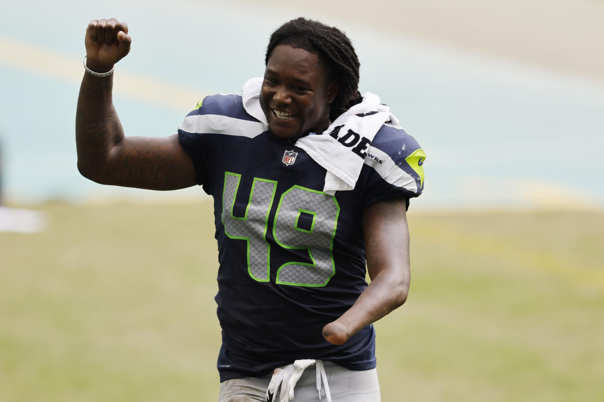 Shaquem Griffin celebrated a win over the Miami Dolphins in 2020, but now he's joining them. (Photo by Michael Reaves/Getty Images)