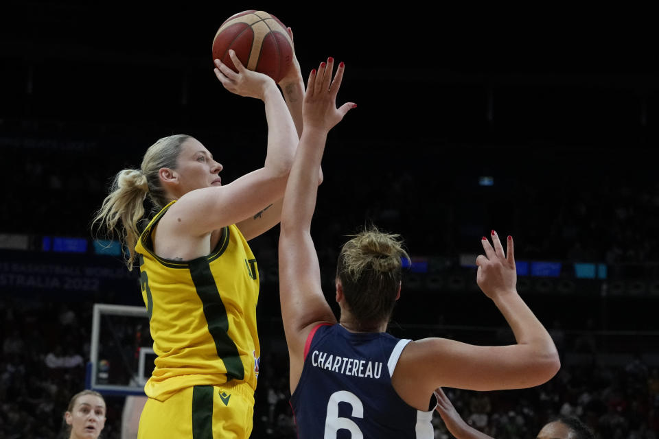 Australia's Lauren Jackson takes a shot at goal as France's Alexia Chartereau attempts to block during their game at the women's Basketball World Cup in Sydney, Australia, Thursday, Sept. 22, 2022. (AP Photo/Mark Baker)