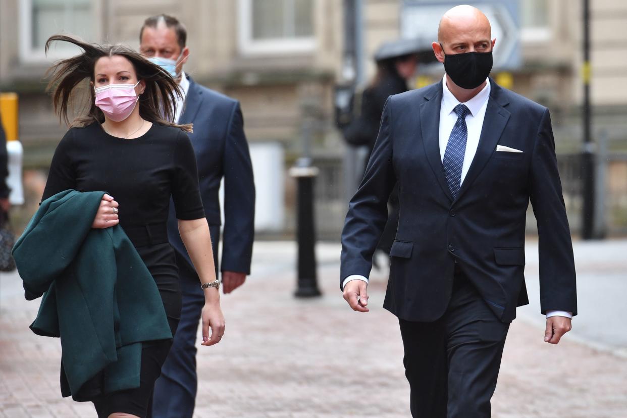 <p>West Mercia Police Constables Benjamin Monk (right) and Mary Ellen Bettley-Smith (left) arrive at Birmingham Crown Court</p> (PA)