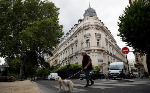 An apartment building owned by Jeffrey Epstein in the 16th district in Paris - Credit: Francois Mori/AP