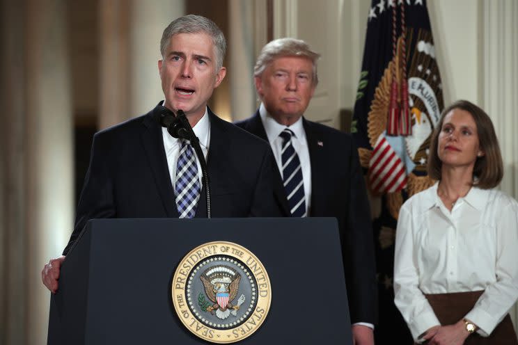 Judge Neil Gorsuch speaks after being nominated by President Donald Trump for the Supreme Court, Jan. 31, 2017, in the East Room of the White House in Washington. Gorsuch's wife Louise is at right. (Photo: Alex Wong/Getty Images)