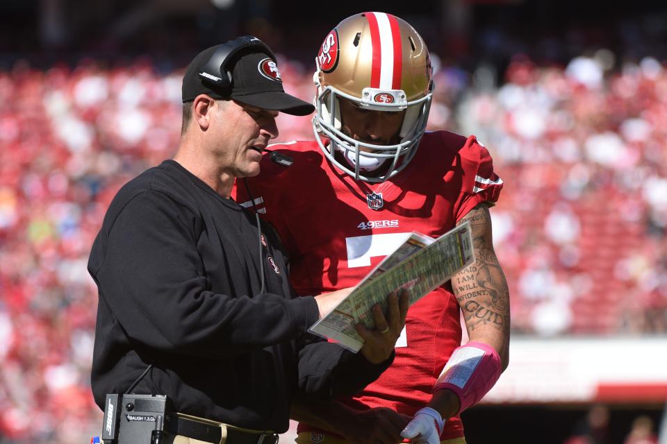 Jim Harbaugh and Colin Kaepernick when both were with the San Francisco 49ers.
