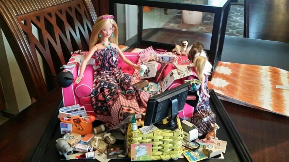 This Barbie diorama was made for Jan Tuckwood by her friend Vince Varia in celebration of her 60th birthday in 2016. It included personal details such as the magazines and newspapers scattered around, the glasses on Barbie's head, a Siamese cat and a Chihuahua.
