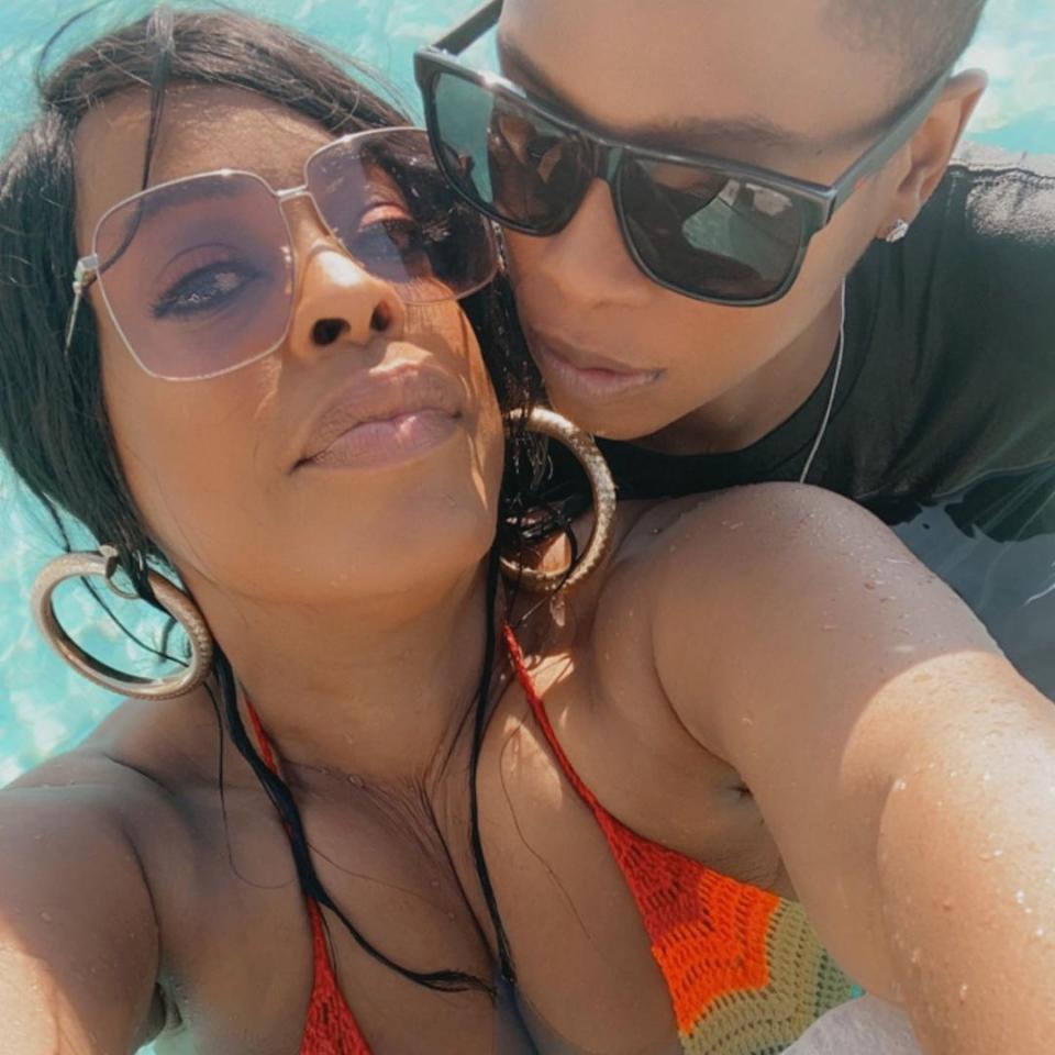 Niecy wore a rainbow bikini top in a cute snap with her wife.
