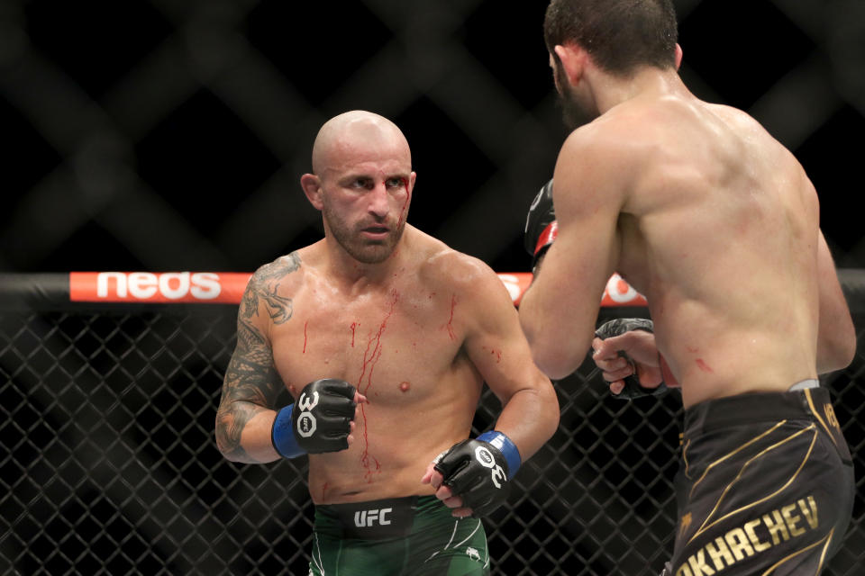 Feb 12, 2023; Perth, WA, AUSTRALIA; Islam Makhachev (red gloves) fights Alexander Volkanovski (blue gloves) during UFC 284 at RAC Arena. Mandatory Credit: Jasmin Frank-USA TODAY Sports