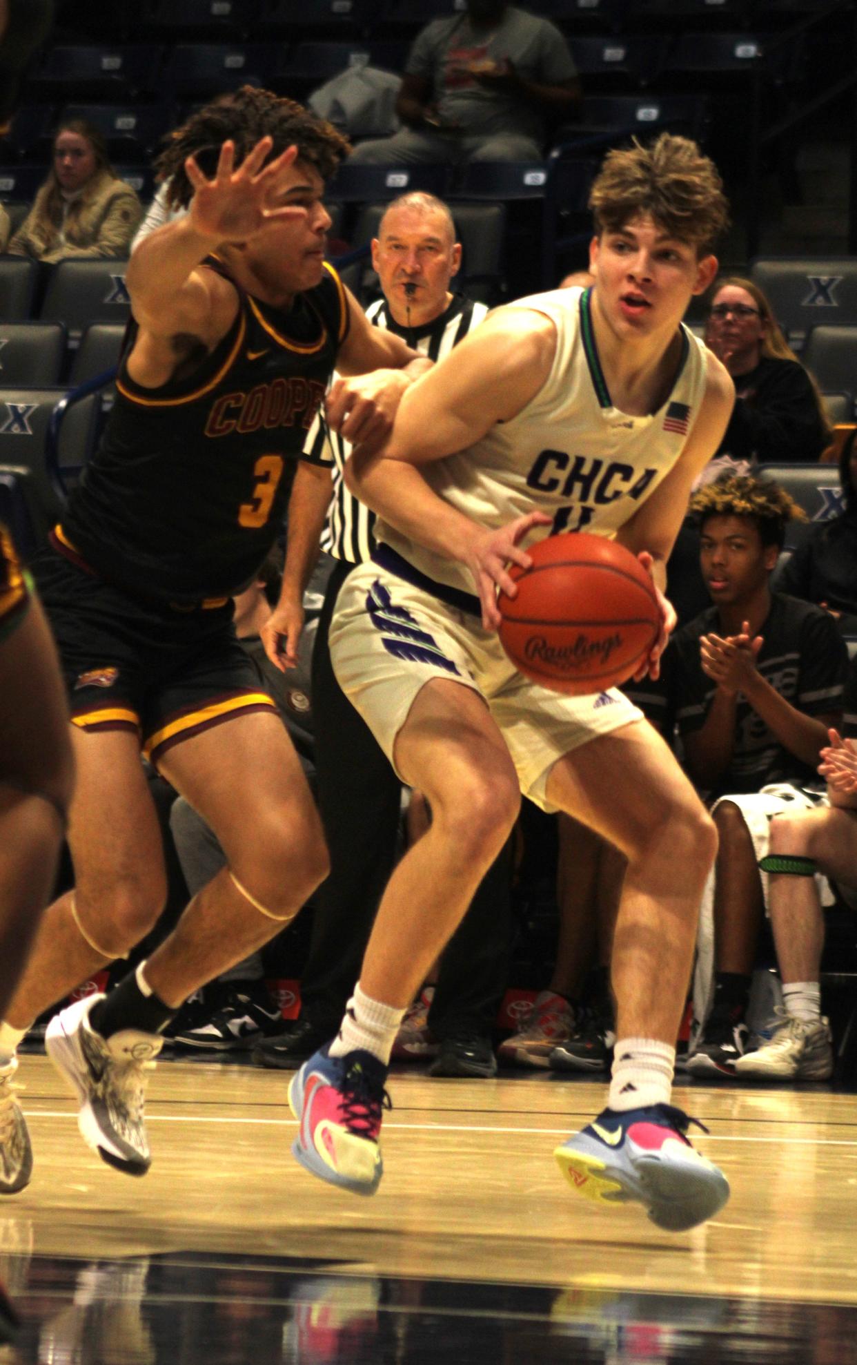 CHCA junior Luke Sanders (with ball) was a first-team all-state selection.