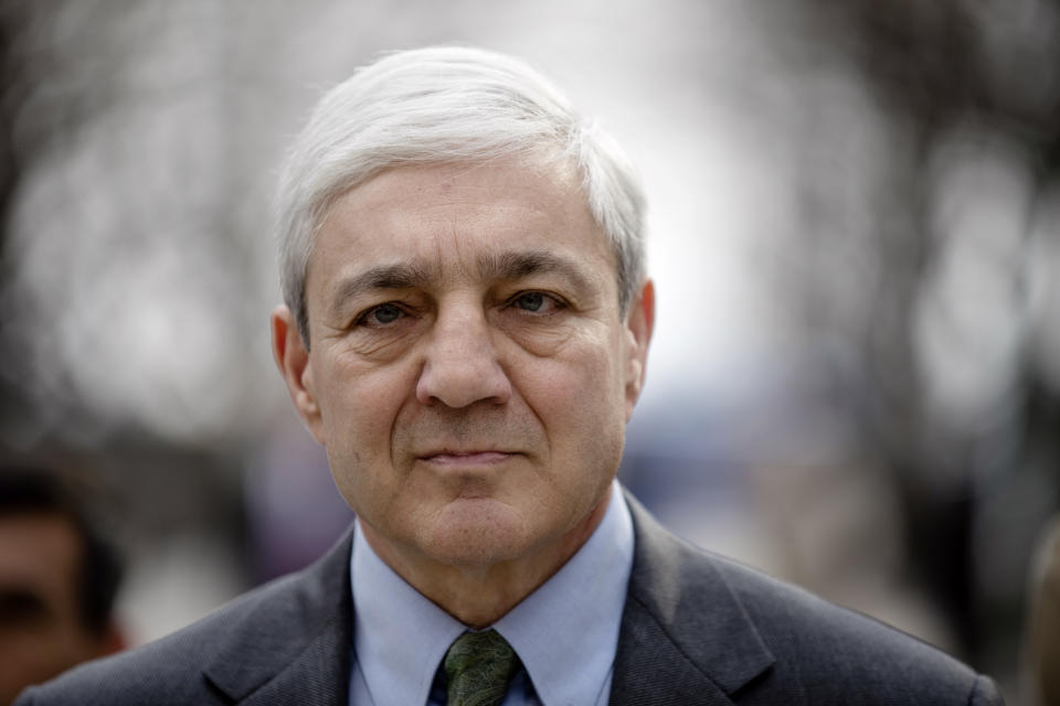 FILE - In this March 24, 2017, file photo, former Penn State president Graham Spanier walks from the Dauphin County Courthouse in Harrisburg, Pa. A federal appeals court on Tuesday, Dec. 1, 2020, reinstated Spanier's conviction for child endangerment over his handling of a report that former assistant football coach Jerry Sandusky had sexually abused a boy in a football team shower. (AP Photo/Matt Rourke, File)