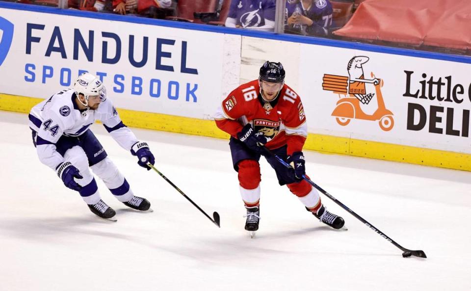 Florida Panthers center Aleksander Barkov (16) carries the puck against Tampa Bay Lightning defenseman Jan Rutta (44) during the first period of game 1 of their first round NHL Stanley Cup series at the BB&T Center on Sunday, May 16, 2021 in Sunrise, Fl.