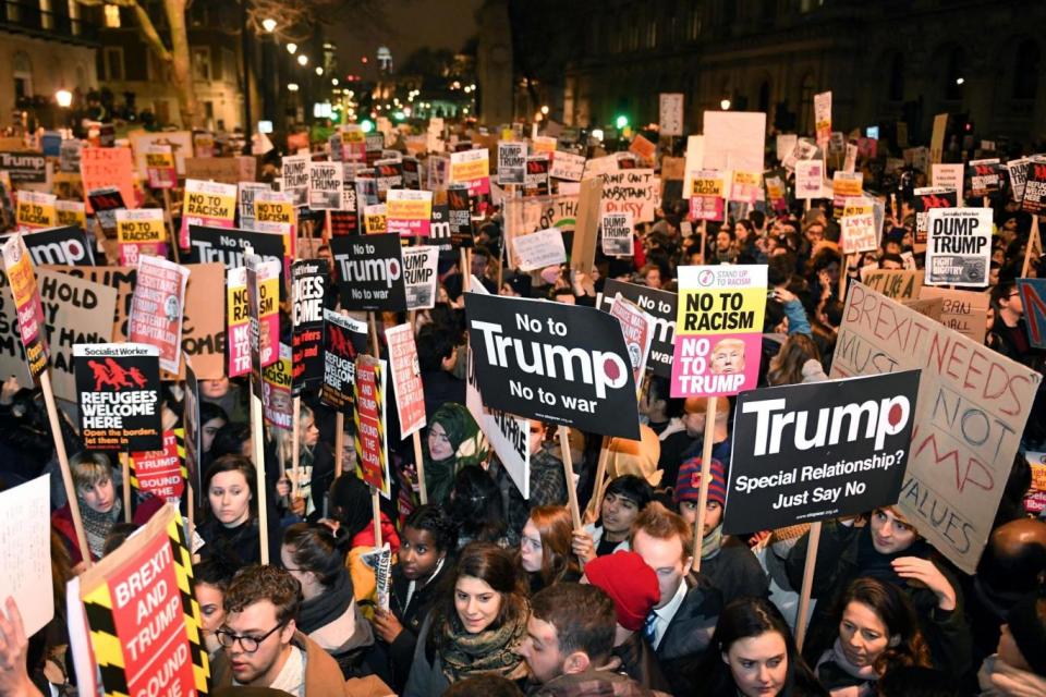 Protesters demonstrate against Donald Trump's Muslim ban in London in 2017 (PA Wire/PA Images)