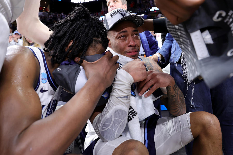 SAN ANTONIO, TEXAS - MARCH 26: Justin Moore #5 of the Villanova Wildcats reacts after an injury after defeating the Houston Cougars 50-44 in the NCAA Men's Basketball Tournament Elite 8 Round at AT&T Center on March 26, 2022 in San Antonio, Texas. (Photo by Carmen Mandato/Getty Images)