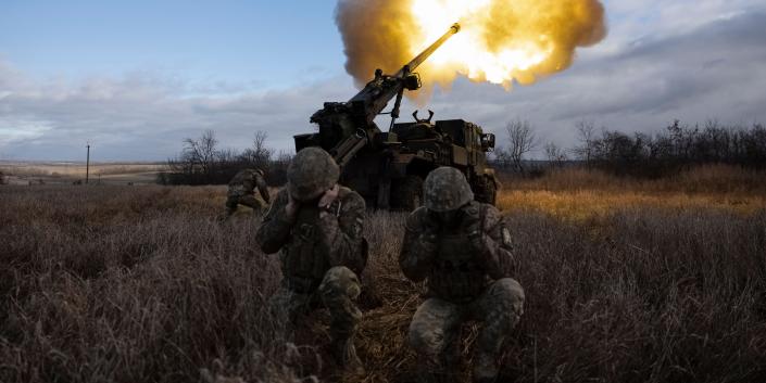 Ukrainian servicemen fire with a CAESAR self-propelled howitzer towards Russian positions in eastern Ukraine on December 28, 2022.