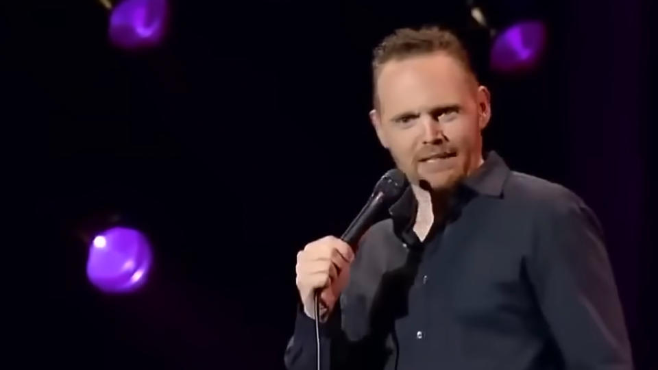 Bill Burr looking annoyed during his stand up act.