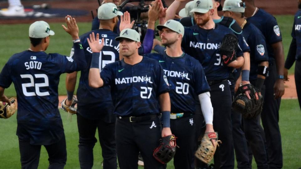 Jul 11, 2023; Seattle, Washington, USA; National League third baseman Austin Riley of the Atlanta Braves (27) reacts with teammates after the ninth inning at T-Mobile Park.
