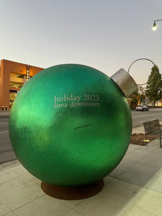 Oversized green ornament.