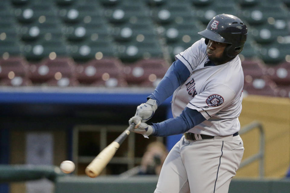 In this May 7, 2019 photo, Round Rock designated hitter Yordan Alvarez, who leads the Triple A league with 13 home runs, swings at a pitch in Papillion Neb. Triple-A baseball is seeing a dramatic increase in home runs with the major league ball being used for the first time at the highest level of the minor leagues. Alvarez now shares the Triple-A lead with 14 homers. (AP Photo/Nati Harnik)