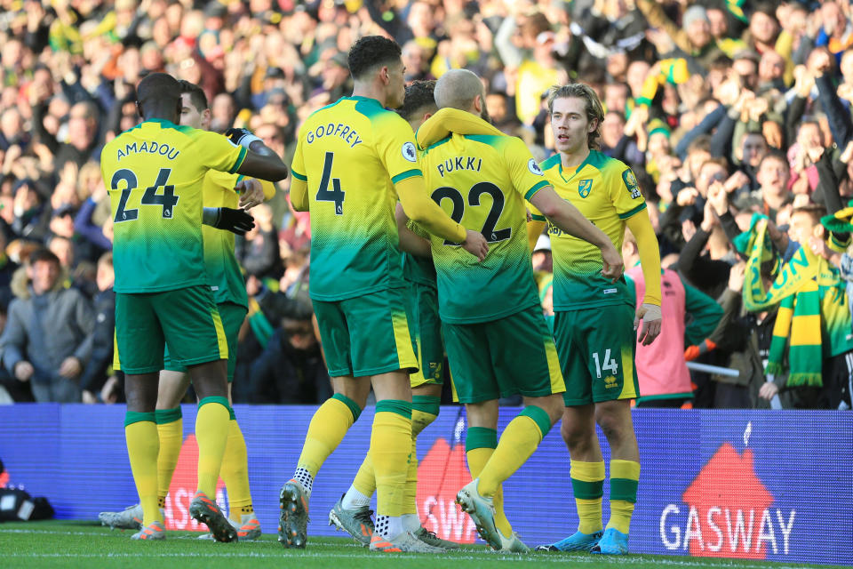 Teemu Pukki of Norwich City celebrates with team mates after scoring his sides first goal. (Credit: Getty Images)