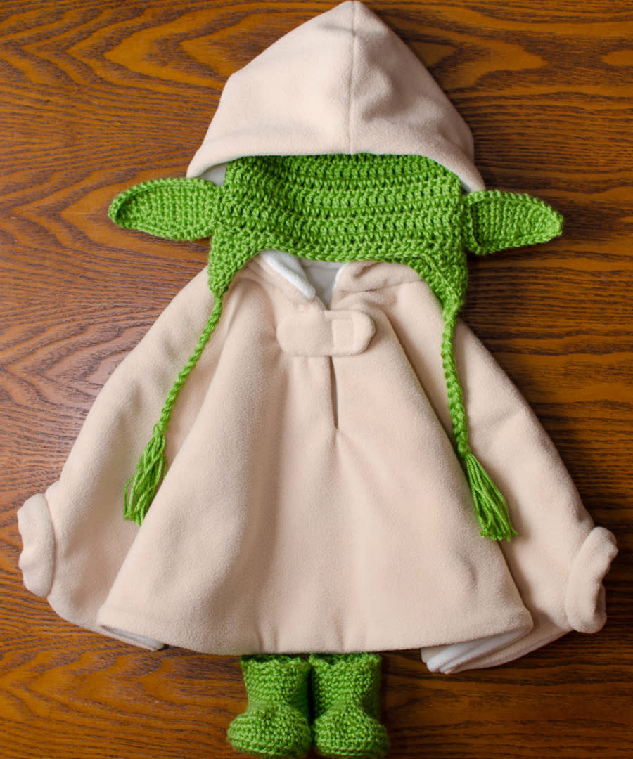 <p>The force will be with your child from a young age in this knit Yoda costume ($90; <a rel="nofollow noopener" href="http://www.awin1.com/cread.php?awinaffid=272513&awinmid=6220&clickref=ISKourtneyHalloweenIJOct&p=https%3A%2F%2Fwww.etsy.com%2Flisting%2F287868623%2Fbaby-yoda-costume-1-3-months-3-6-months%3Fga_order%3Dmost_relevant%26ga_search_type%3Dall%26ga_view_type%3Dgallery%26ga_search_query%3Dbaby%2520yoda%2520costume%26ref%3Dsr_gallery_1%26source%3Daw%26awc%3D6220_1477408286_25ed411928fe4f282e10" target="_blank" data-ylk="slk:etsy.com;elm:context_link;itc:0;sec:content-canvas" class="link ">etsy.com</a>). </p>