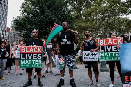 Protesters march and rally on the fifth anniversary of the death of Eric Garner in New York