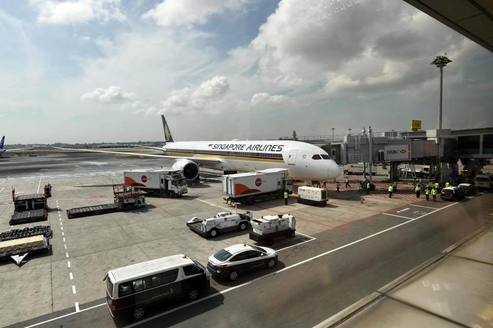 Singapore Airlines (SIA) world's first Boeing 787-10 aircraft parked at the terminal in Singapore Changi Airport after its arrival from Boeing's production facility in North Charleston, South Carolina at Singapore Changi Airport on March 28, 2018. The 787-10 is the latest variant of Boeing's Dreamliner family of aircraft. SIA is the largest customer for the 787-10, with firm orders for 49 of the type. / AFP PHOTO / Roslan RAHMAN        (Photo credit should read ROSLAN RAHMAN/AFP via Getty Images)