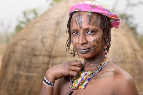 An Mbororo woman with scarification - Credit: GETTY