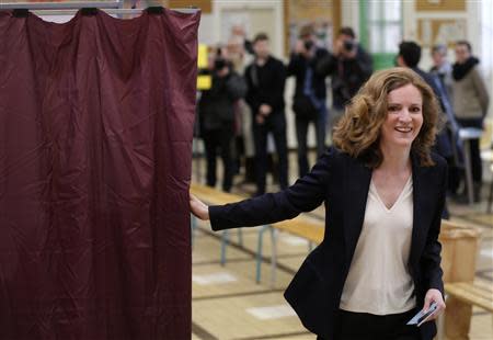 Nathalie Kosciusko-Morizet, conservative UMP political party candidate for the mayoral election, exits the voting booth as she arrives to cast her ballot at a polling station in Paris March 30, 2014. The French go to the polls to cast votes in the second round 2014 Municipal elections on Sunday to elect city mayors and councillors for a six-year term. REUTERS/Christian Hartmann