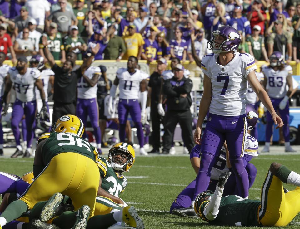 Minnesota Vikings kicker Daniel Carlson reacts after missing a field goal in the final seconds of overtime an NFL football game against the Green Bay Packers Sunday, Sept. 16, 2018, in Green Bay, Wis. The game ended in a 29-29 tie. (AP Photo/Mike Roemer)