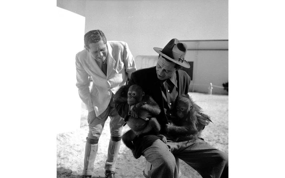 <p>President and director of Ringling Bros. and Barnum & Bailey Circus John Ringling North (left) stands nearby during a rehearsal for Circus in Sarasota, Florida in 1949.</p>