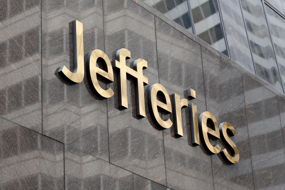 FILE - This May 23, 2019, file photo shows the logo for the Jefferies Financial Group in New York. Jefferies Financial Group announced Sunday, March 29, 2020, that its chief financial officer, Peregrine C. Broadbent, died Sunday from coronavirus complications. He was 56. (AP Photo/Richard Drew, File)