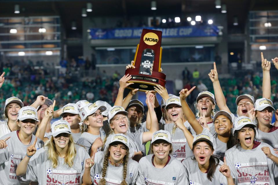 The Santa Clara Broncos celebrate their women's soccer championship.