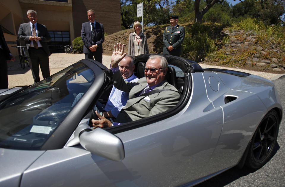 Prince Consort Henrik of Denmark waves as he tests drive a Tesla Roadster during his visit to Tesla Motors headquarters in Palo Alto, California June 13, 2011. REUTERS/Stephen Lam    (UNITED STATES - Tags: ROYALS TRANSPORT BUSINESS)