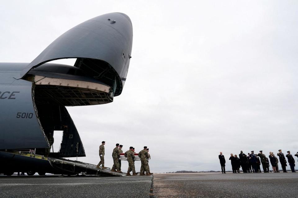 PHOTO: President Joe Biden attends the dignified transfer of the remains of Army Reserve Sergeants William Rivers, Kennedy Sanders and Breonna Moffett, at Dover Air Force Base in Dover, Delaware, on Feb. 2, 2024. (Joshua Roberts/Reuters)